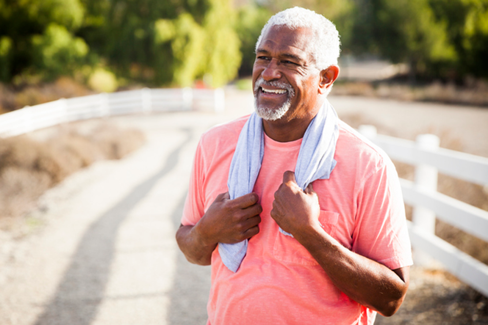 Man with a towel, just completing a workout