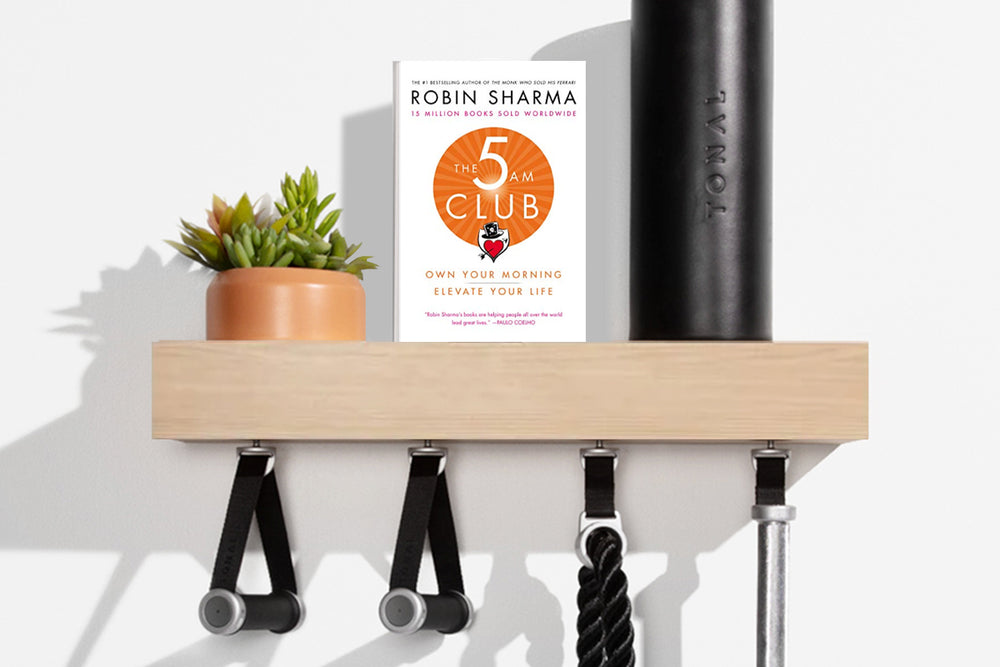 The 5 AM Club by Robin Sharma, on a Tonal accessory shelf