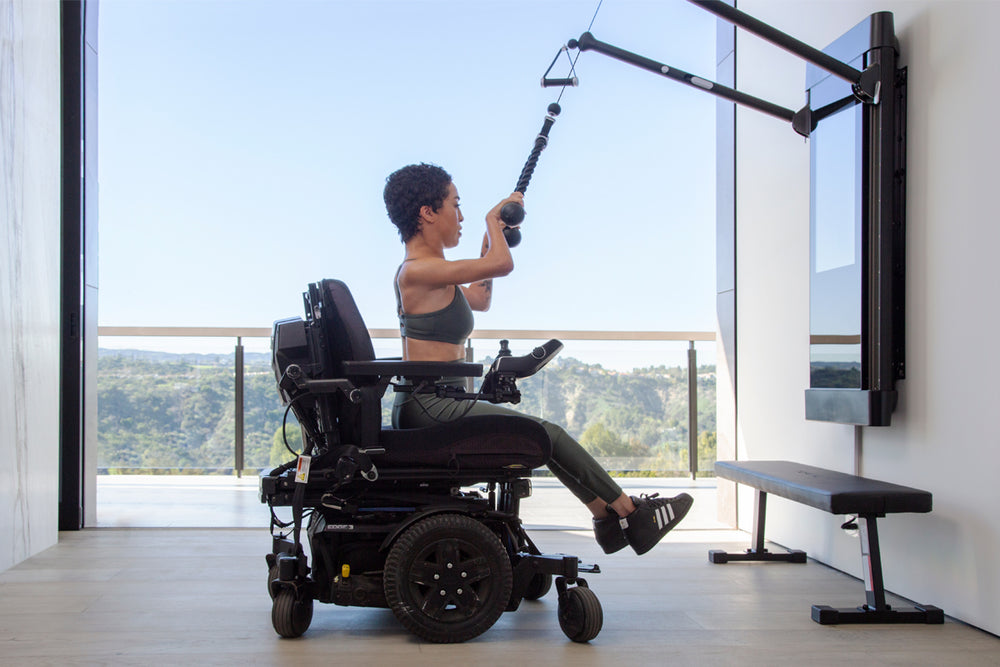 Actress Jillian Mercado exercising on Tonal.