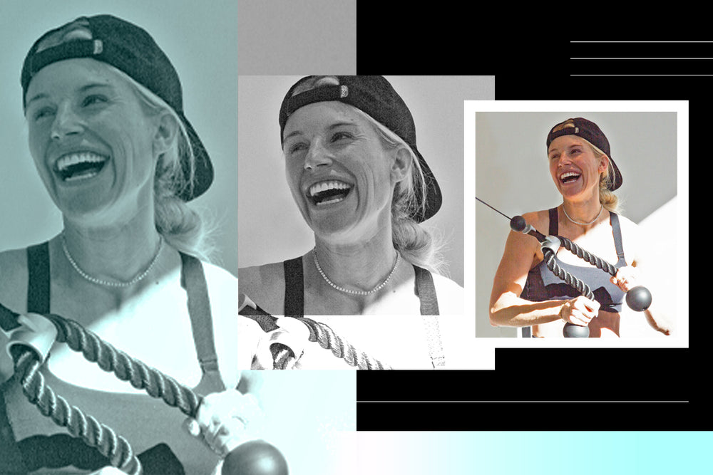 Kelly Stafford using the Tonal trainer and smiling.