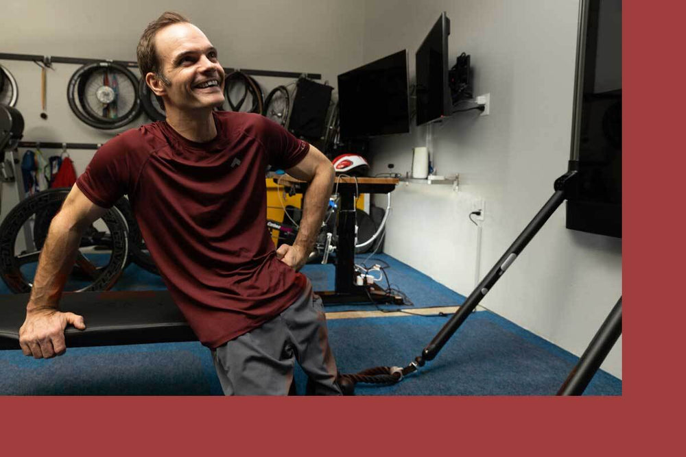 Paralympian Travis Gaertner posing with Tonal and bike gear.