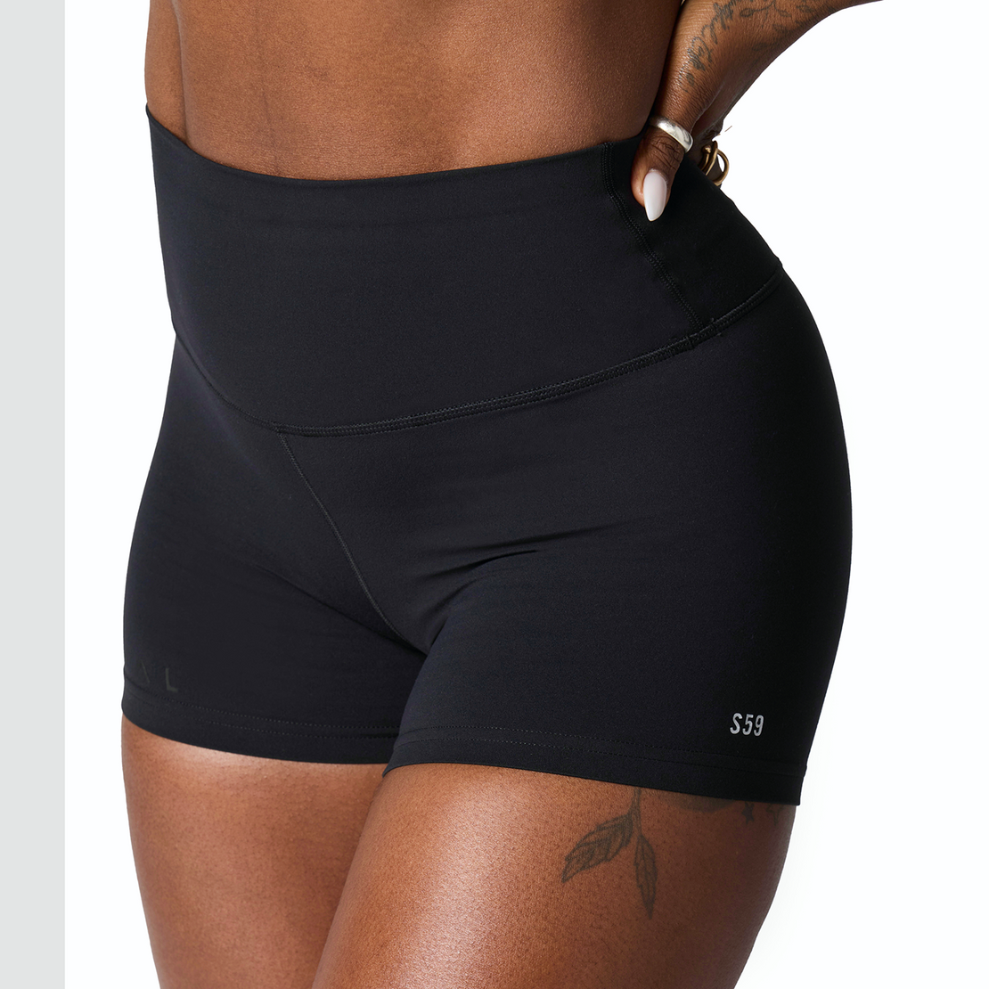 Woman wearing Tonal x Splits59 Airweight 3.5 inch short in Black
