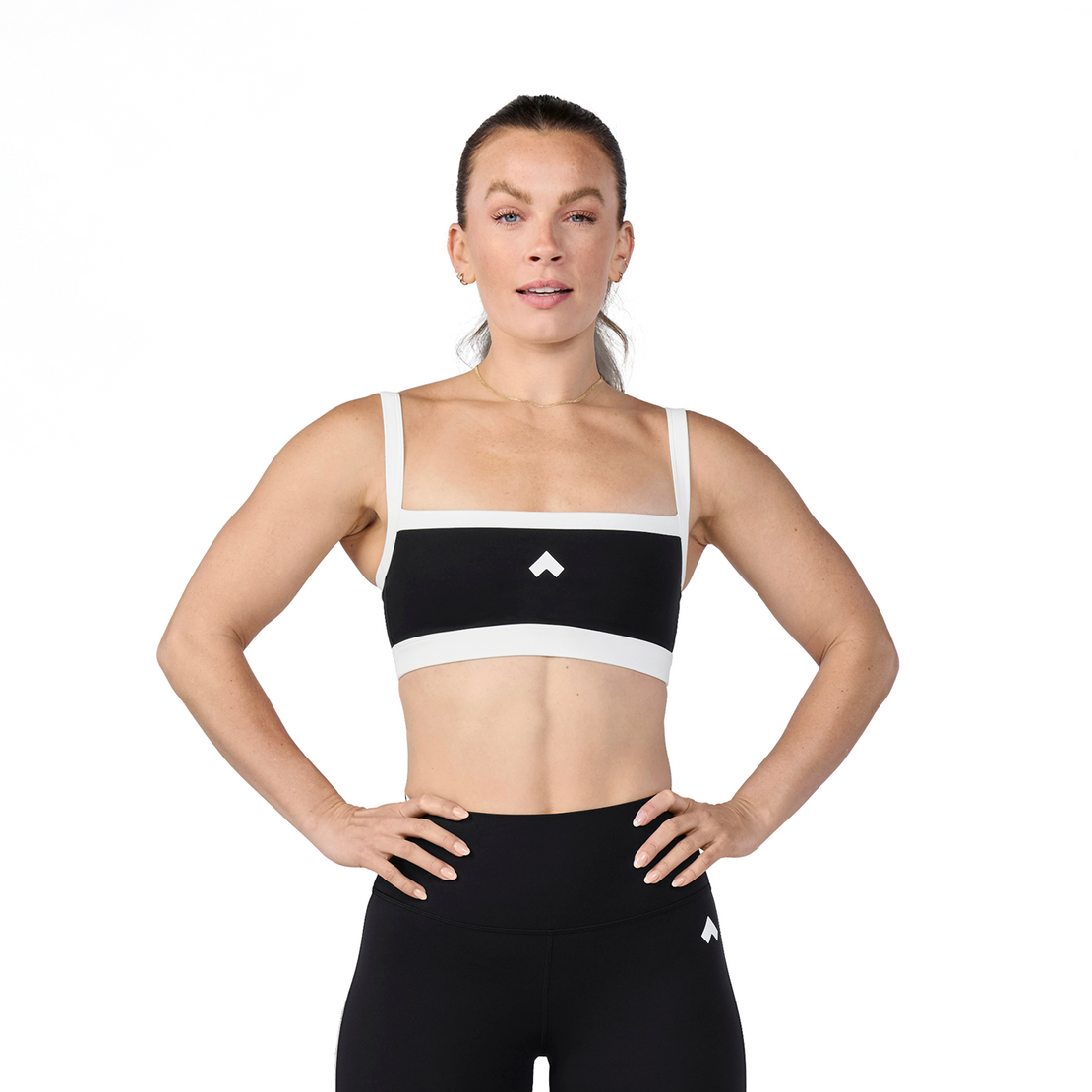 Woman wearing Tonal x Splits59 Monah Rigor Sports Bra in Black and White