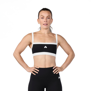 Woman wearing Tonal x Splits59 Monah Rigor Sports Bra in Black and White