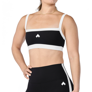Woman wearing Tonal x Splits59 Monah Rigor Sports Bra in Black and White