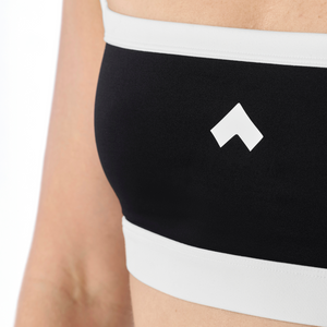 Woman wearing Tonal x Splits59 Monah Rigor Sports Bra in Black and White