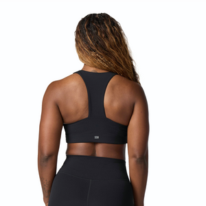 Woman wearing Tonal x Splits59 Sarah Airweight Bra in Black