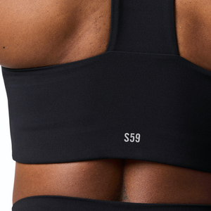 Woman wearing Tonal x Splits59 Sarah Airweight Bra in Black