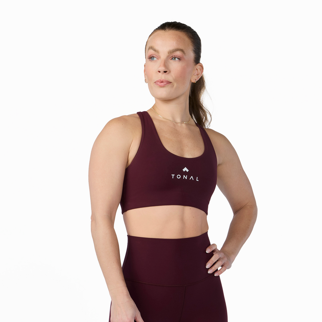 Woman wearing Tonal x Splits59 Sarah Airweight Bra in Dark Cherry