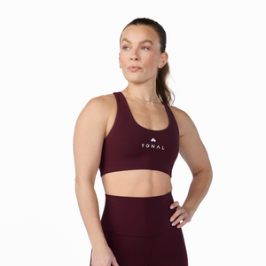 Woman wearing Tonal x Splits59 Sarah Airweight Bra in Dark Cherry