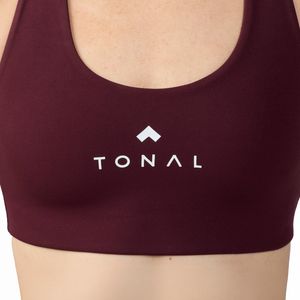 Woman wearing Tonal x Splits59 Sarah Airweight Bra in Dark Cherry