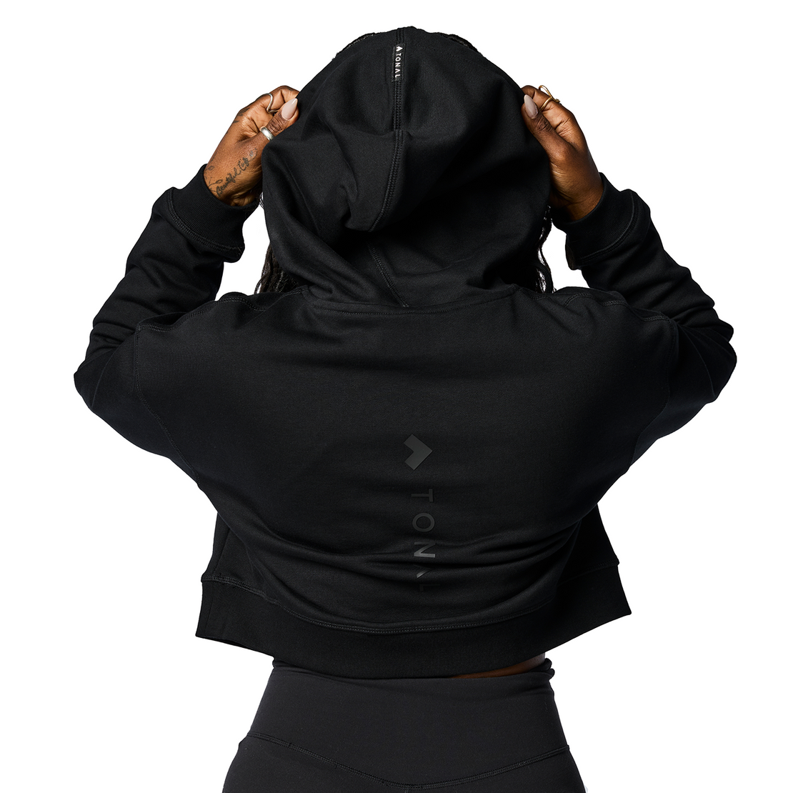 Back of the black Tonal Performance Crop Hoodie