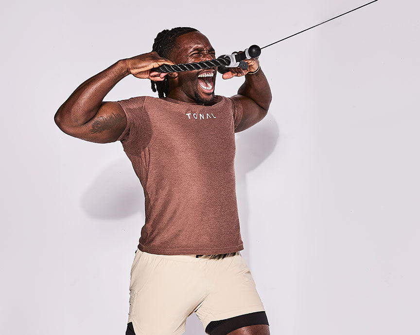 Tonal Coach Ackeem performing a Cable Face Pull to exercise his Rear Dealts