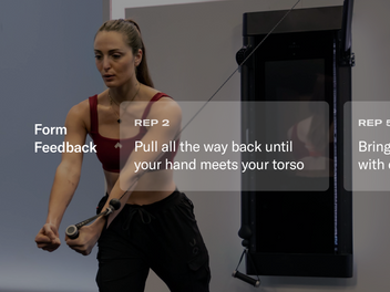 Woman exercising using a Tonal trainer with feedback text overlayed on image