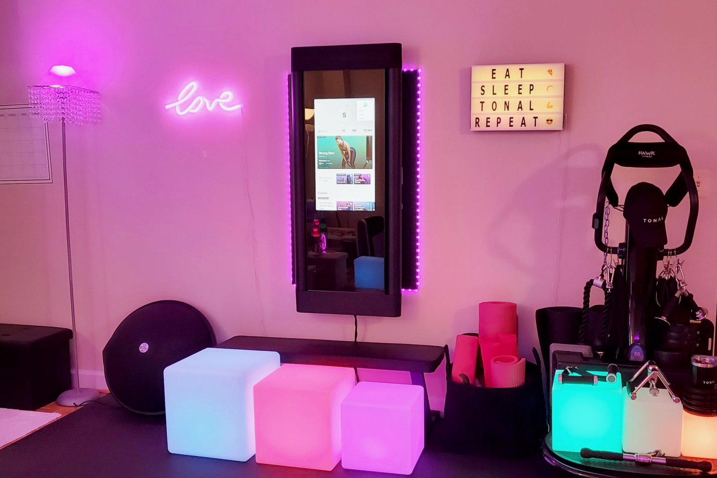 Tonal home gym with neon lights