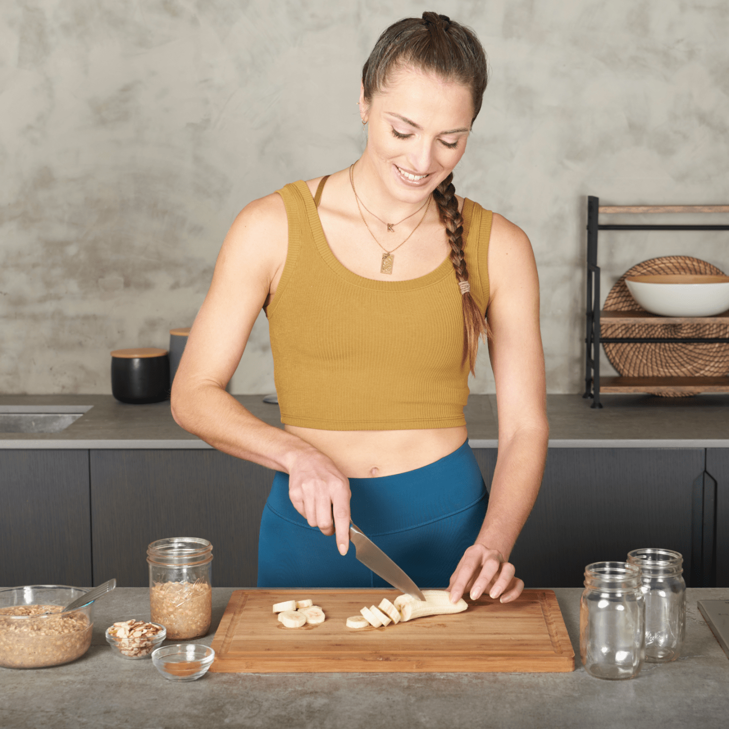 Coach Kristina Centenari chopping bananas for her overnight oats.