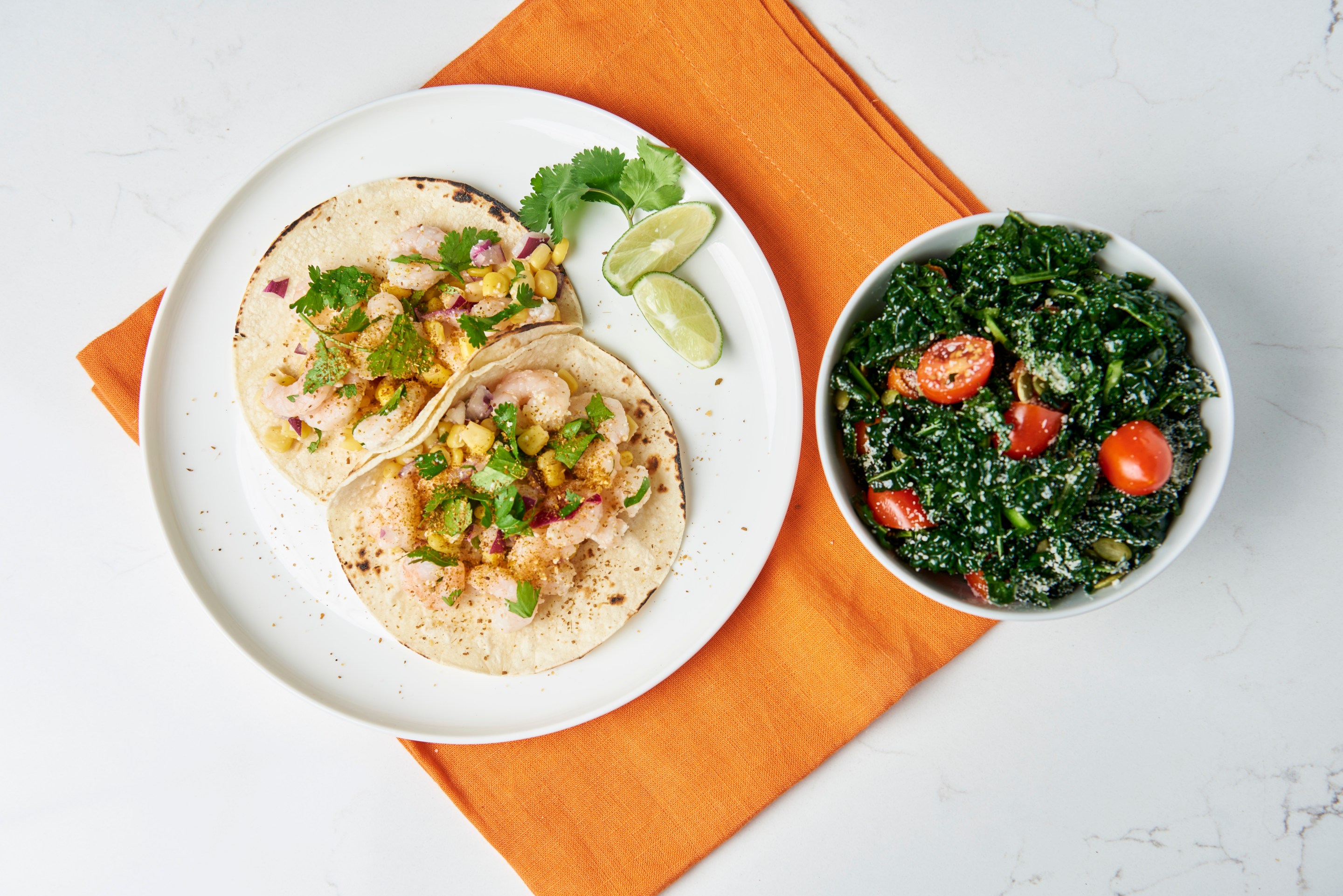 Shrimp tacos with kale salad