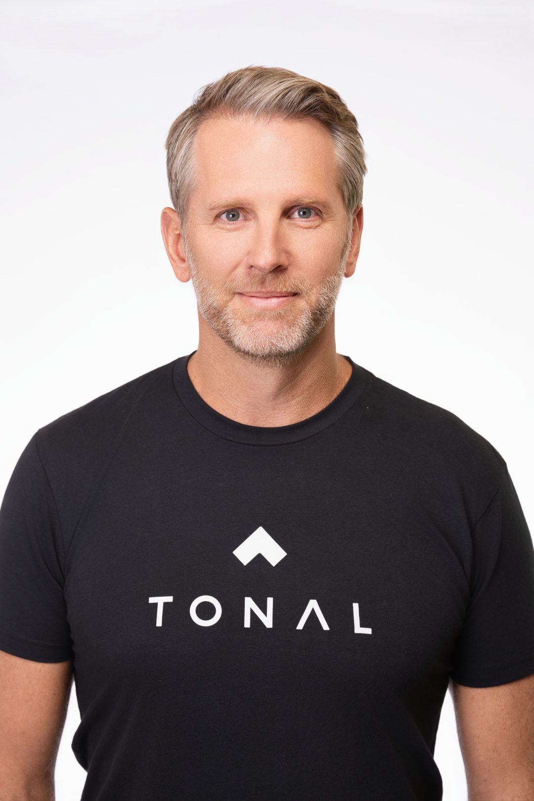 Headshot of Tonal's CEO, Darren MacDonald